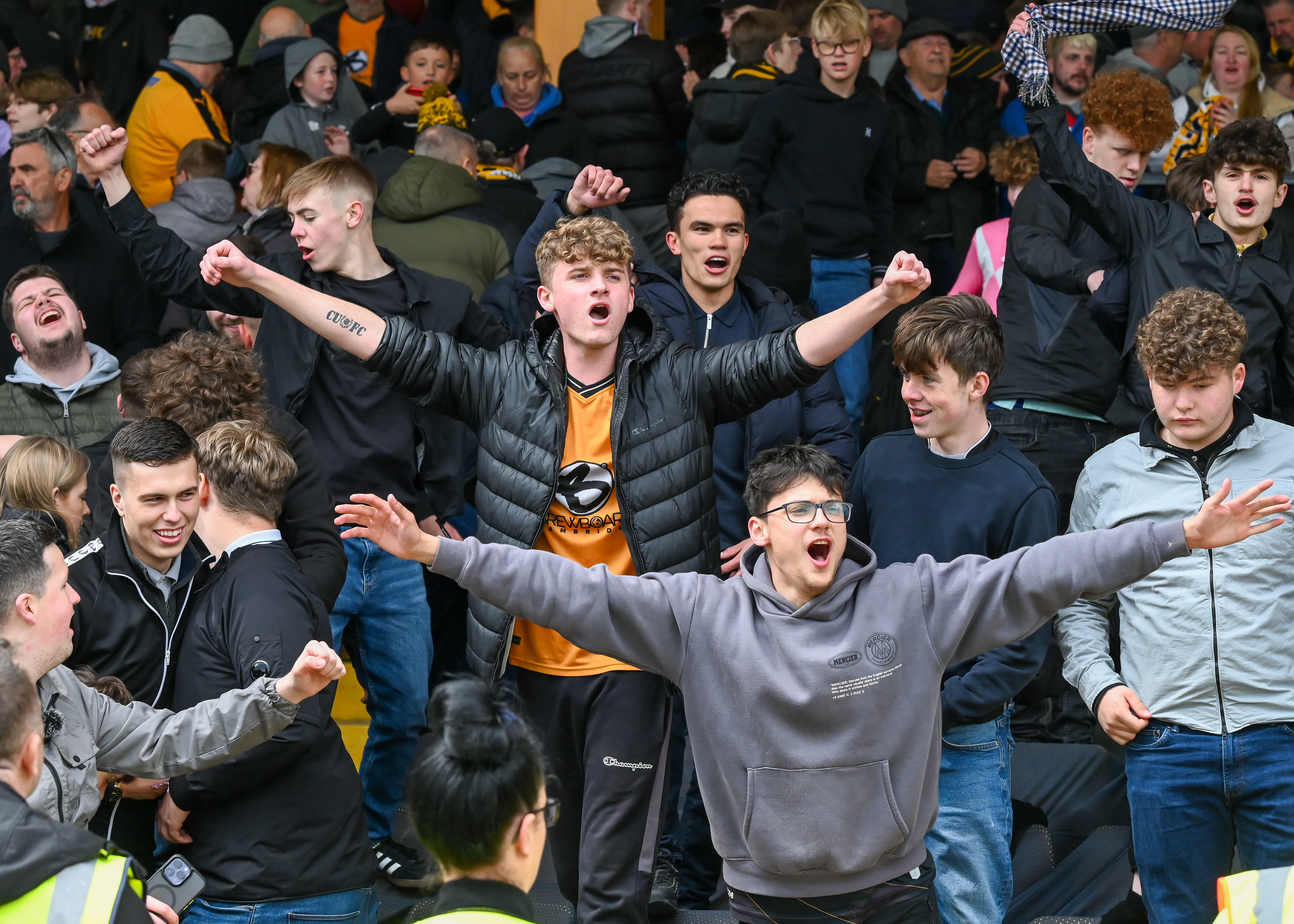 U's fans celebrating in the stands