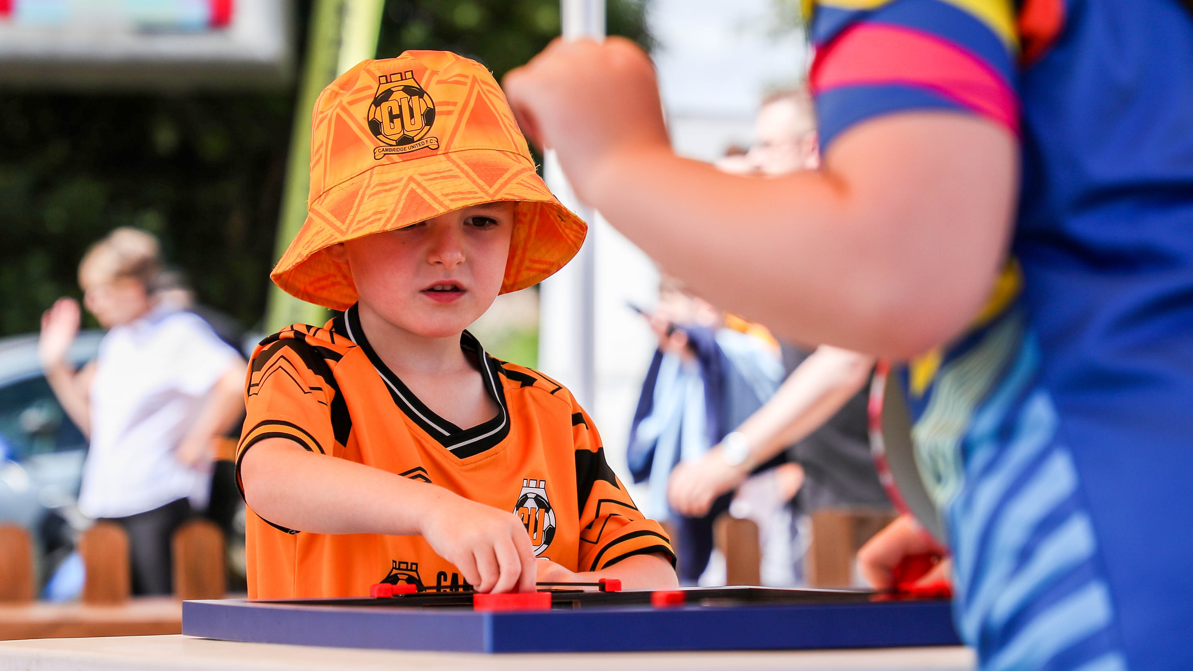 A young supporter playing in the Kids' Zone at the Cledara Abbey Stadium