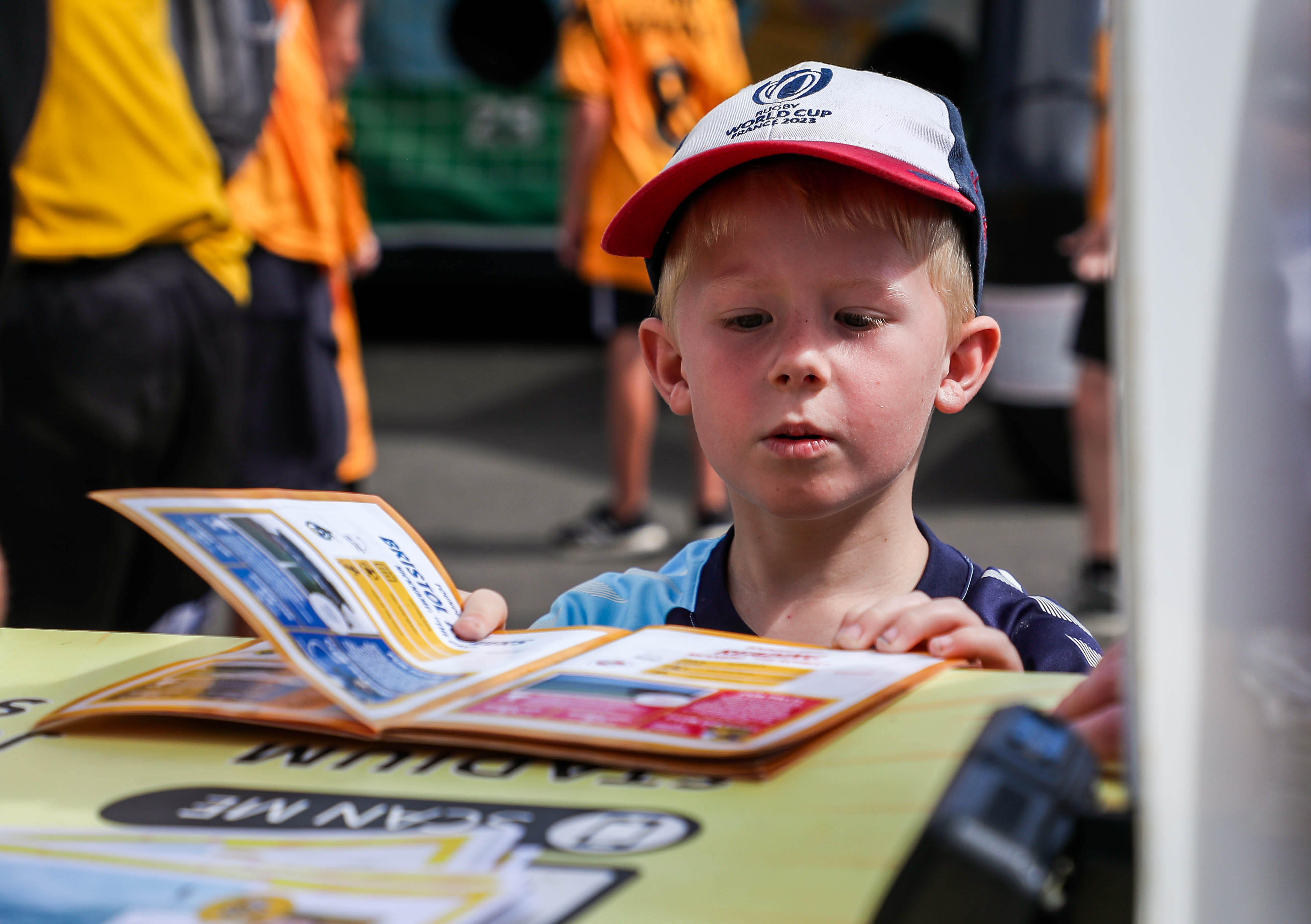 A young supporter gets his Matchday Passport stamped