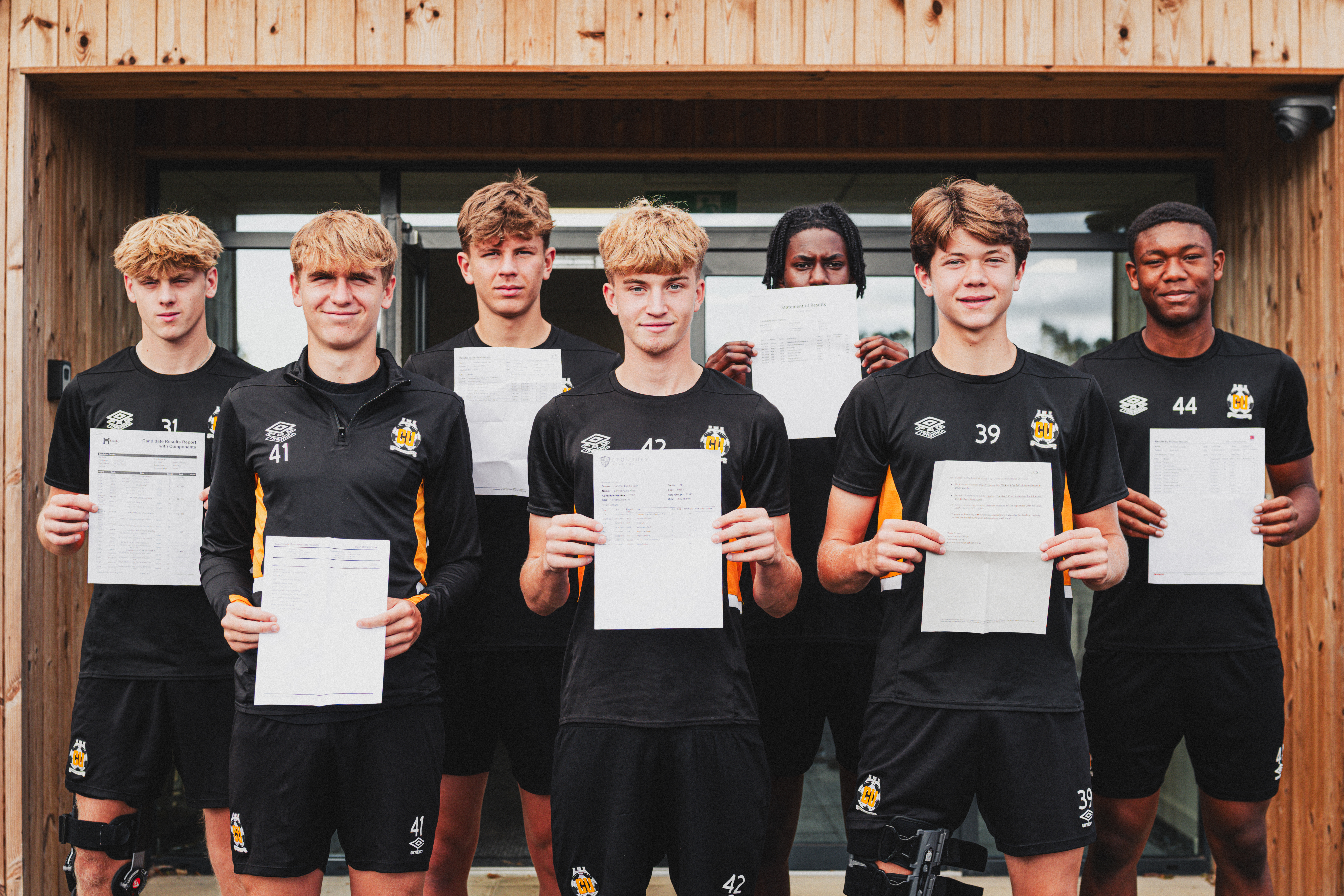 Cambridge United Scholars with their GCSE results