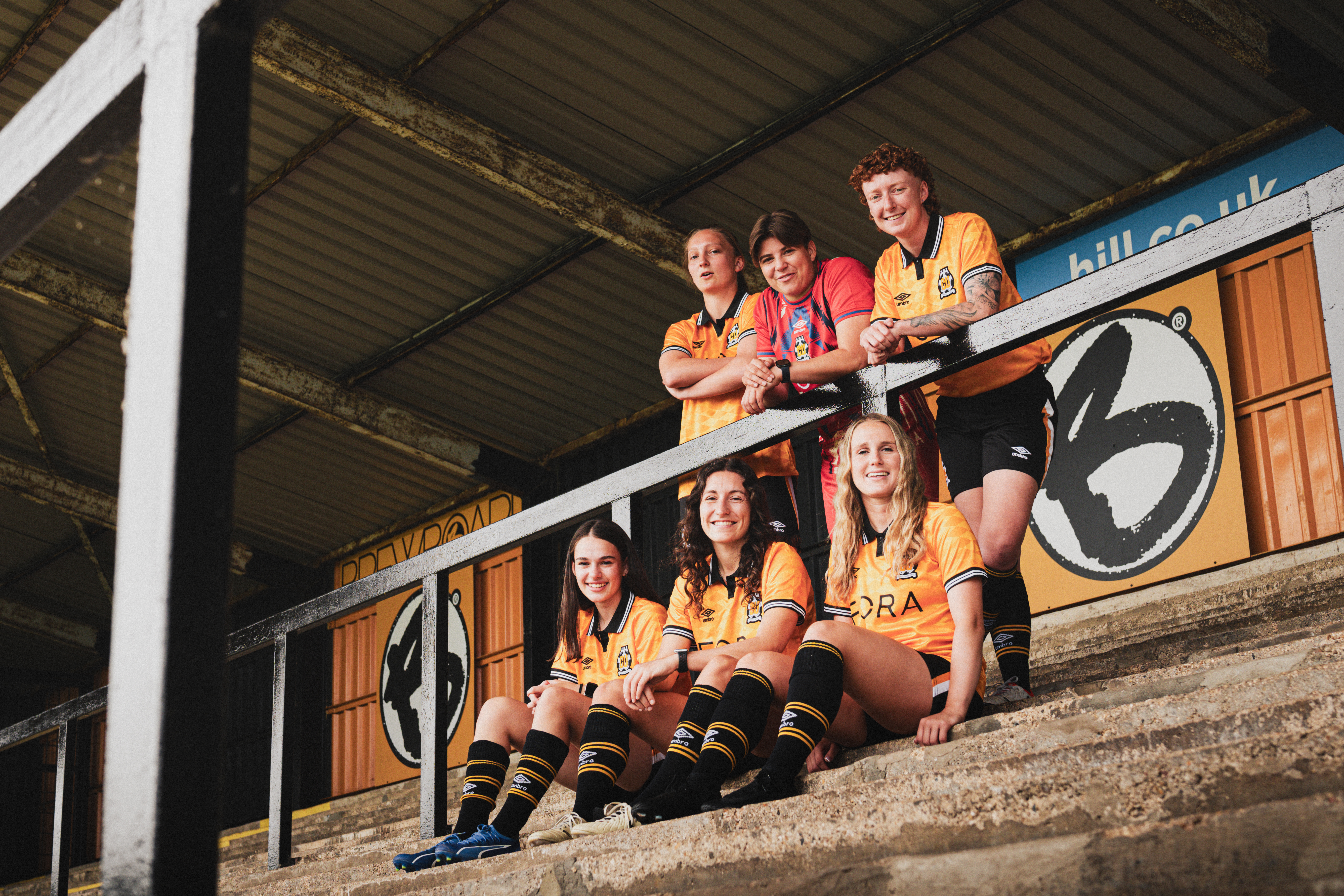 Cambridge United Women players pose at the Cledara Abbey Stadium