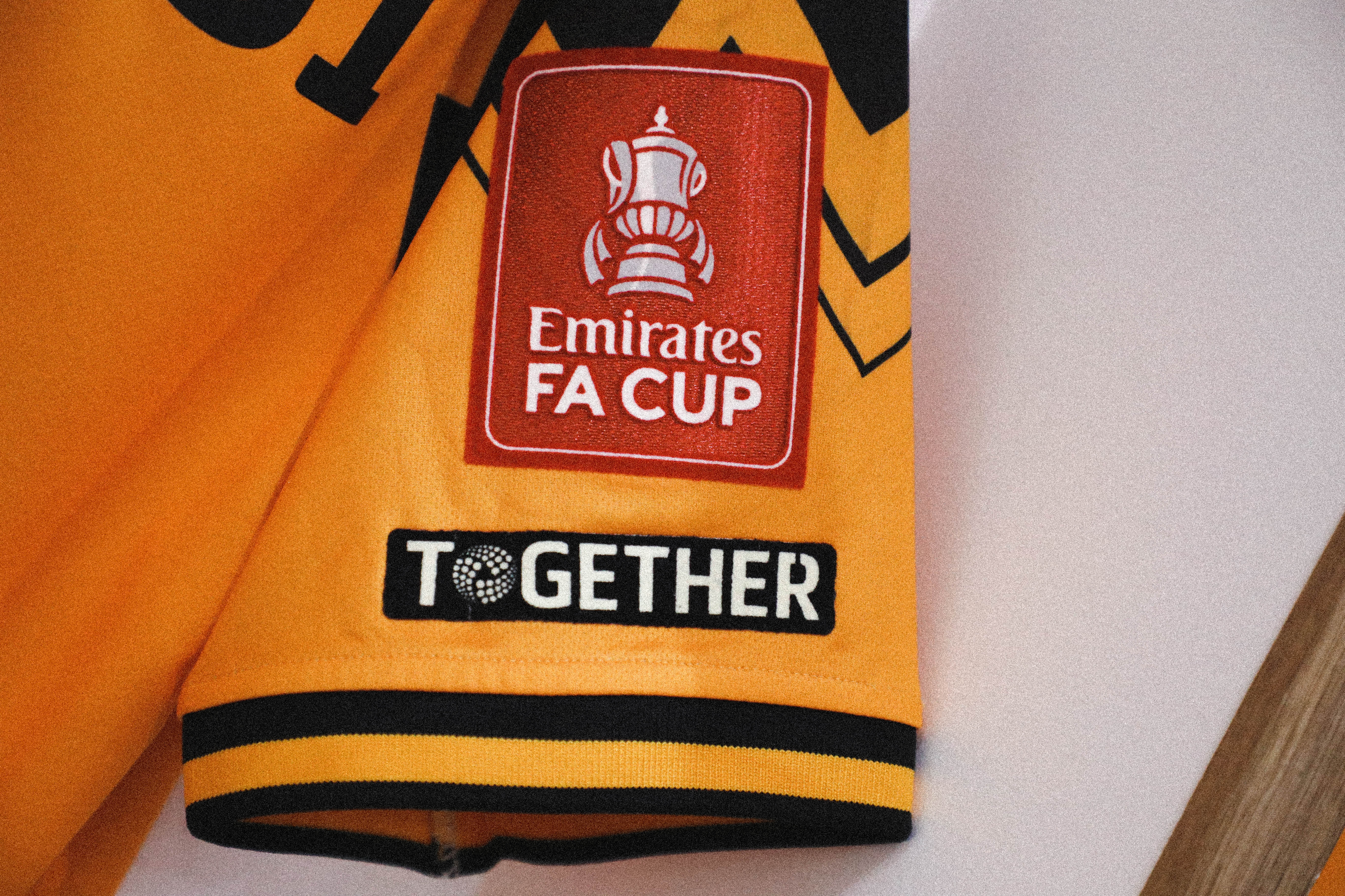 A close up of United's shirt with Emirates FA Cup branding