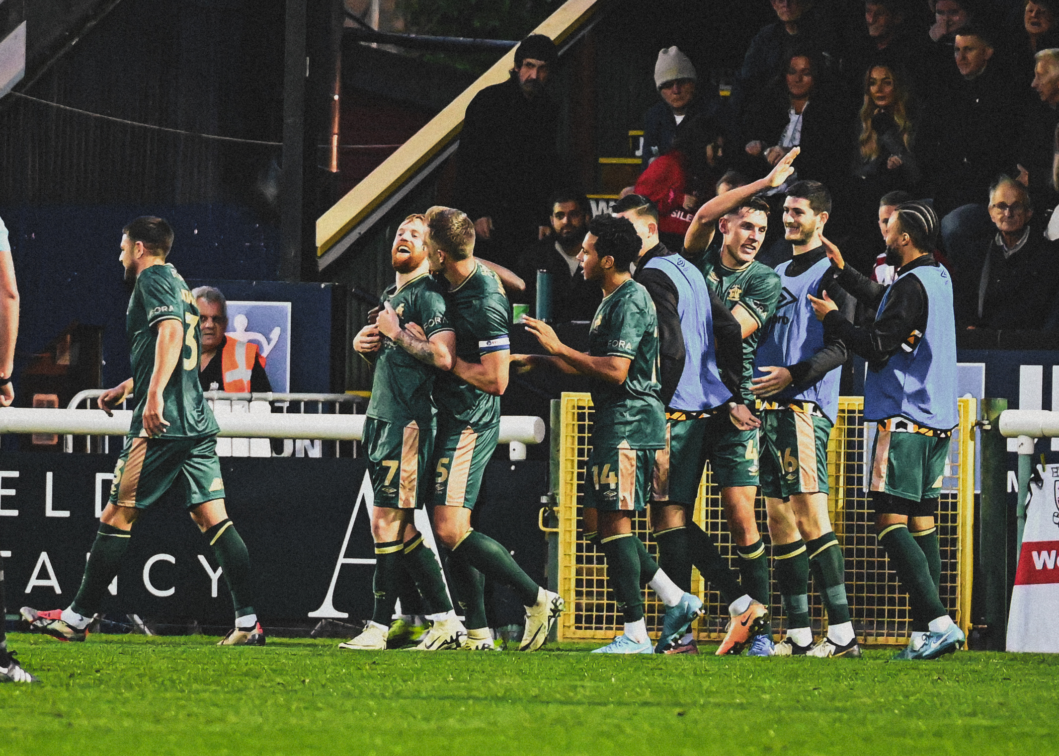 James Brophy celebrates scoring against Woking