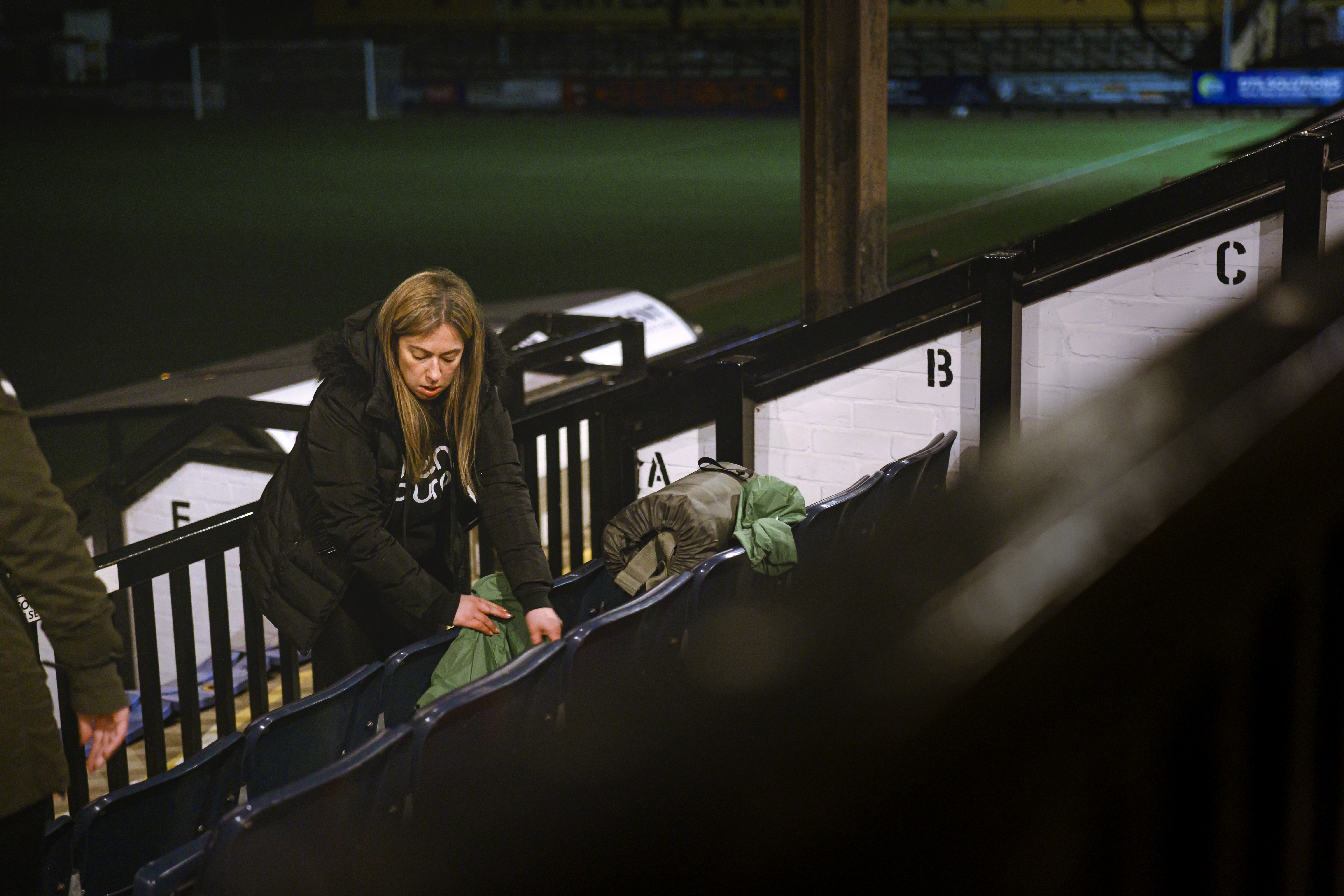 A woman gets ready for the Cambridge United Foundation Sleepout