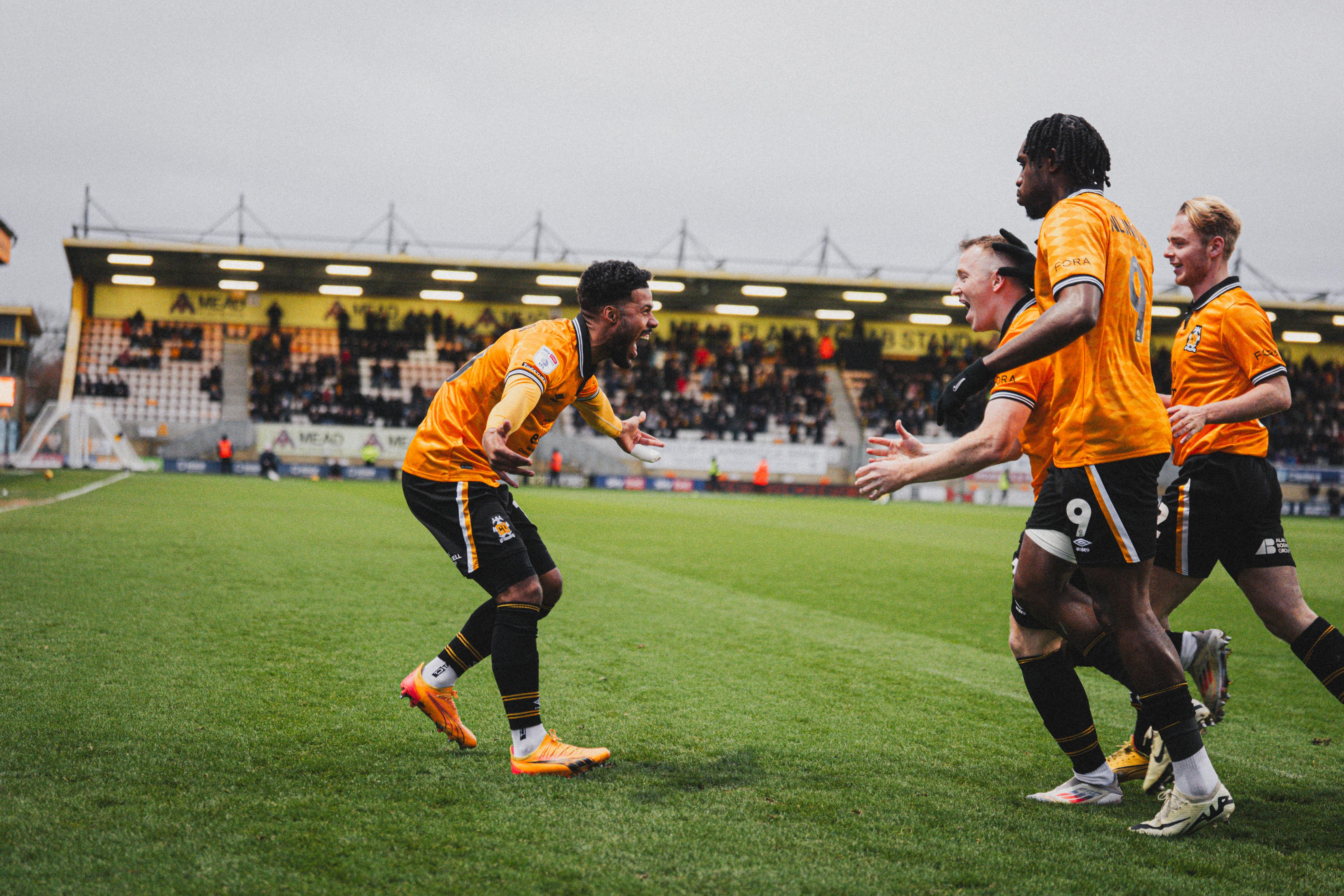 The team celebrate a goal against Shrewsbury