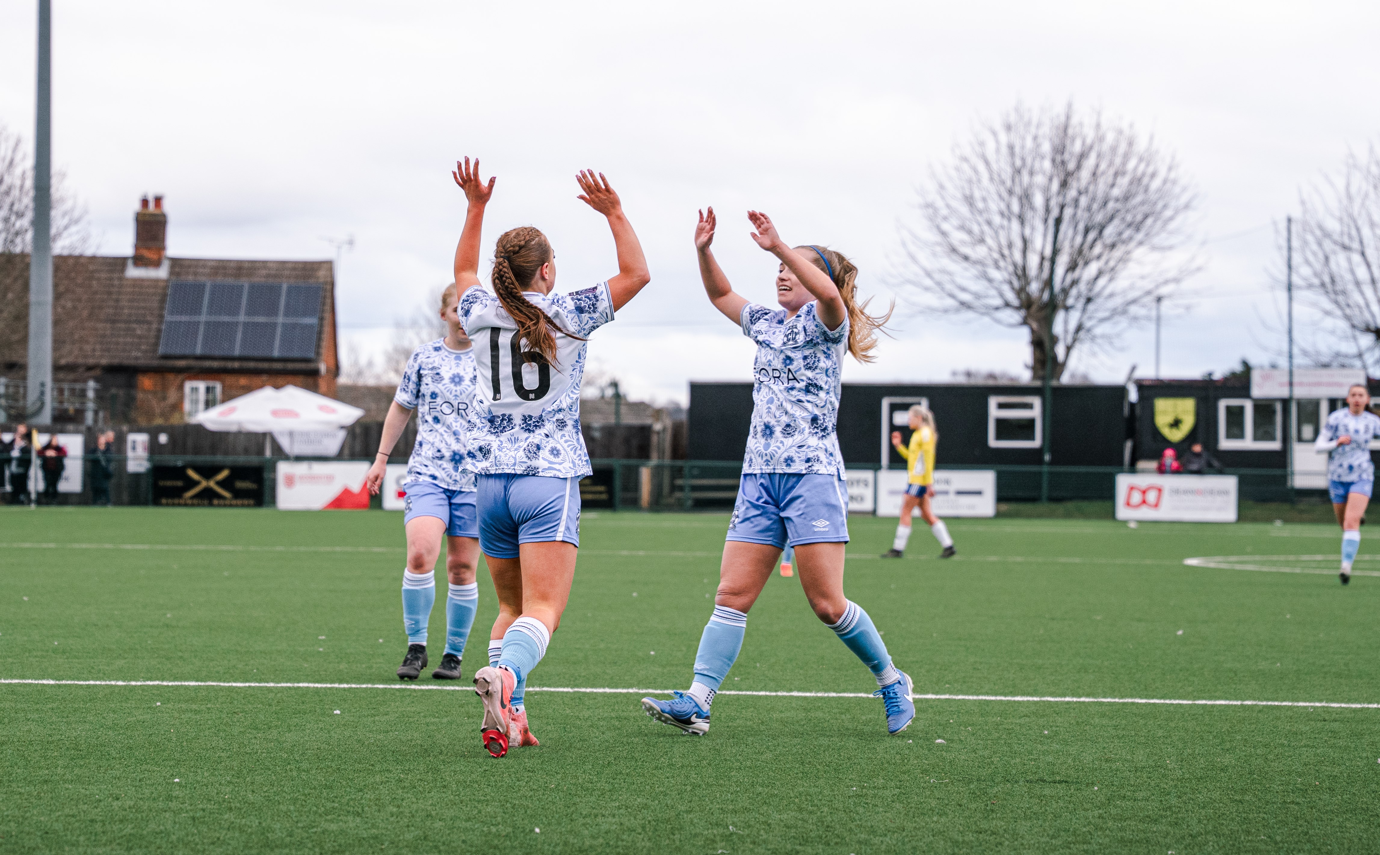 Cambridge United Women players celebrate