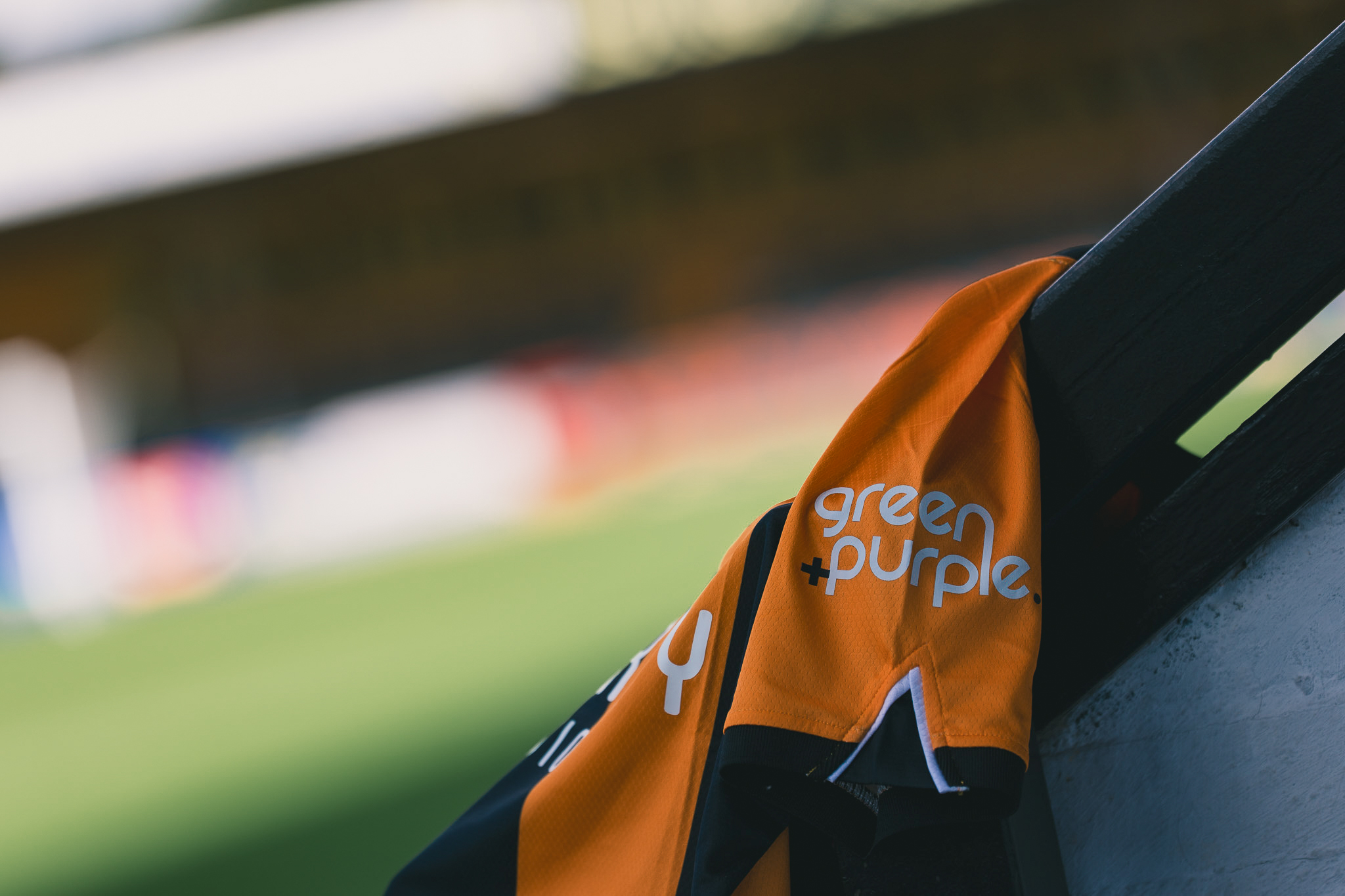 green and purple shirt sleeve 