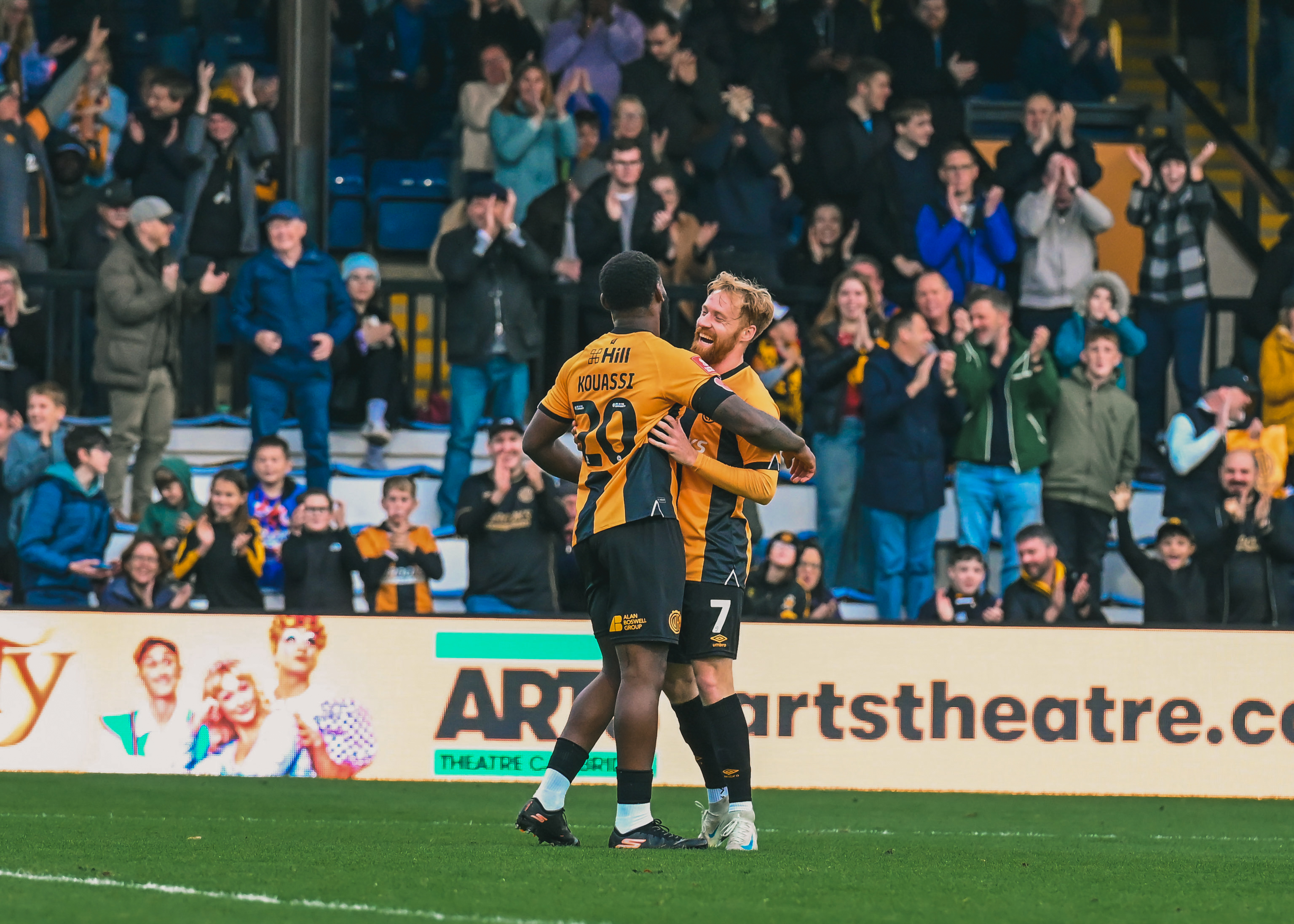 James Brophy and Kylian Kouassi celebrate
