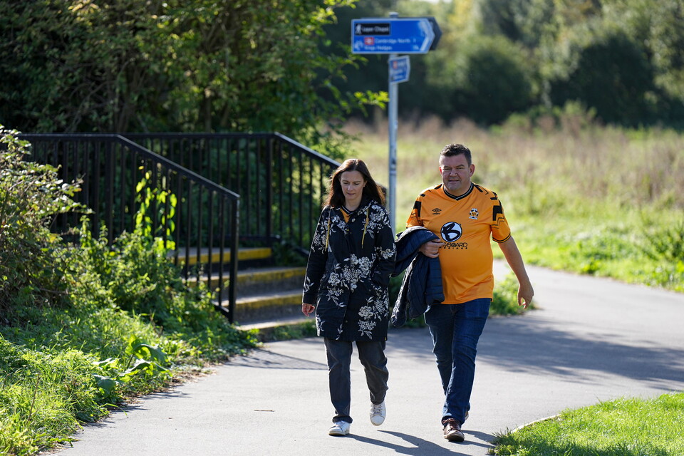 Fans walk to the Cledara Abbey Stadium