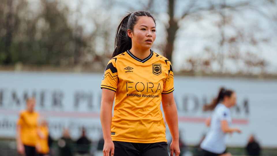 Book and Ball Crest imagery