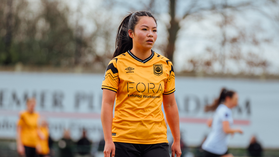 Book and Ball Crest imagery