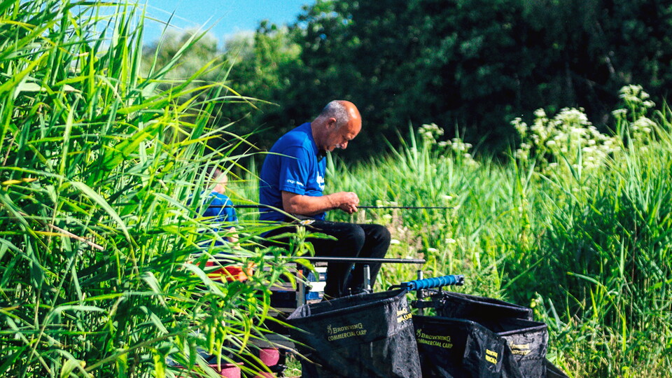 Ian Darler sitting on the dock