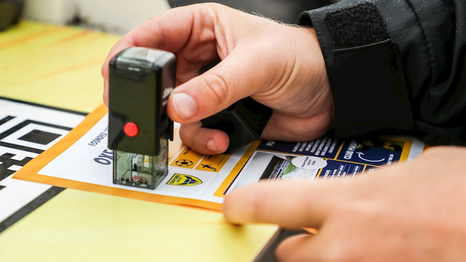 Junior U's Passport being stamped