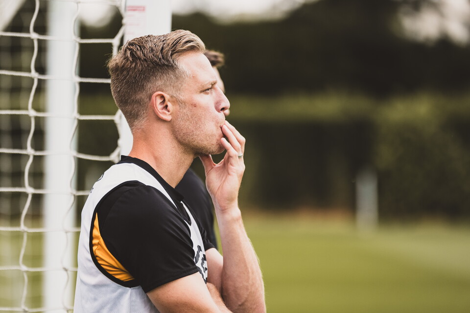 Michael Morrison looking out on to the pitch.