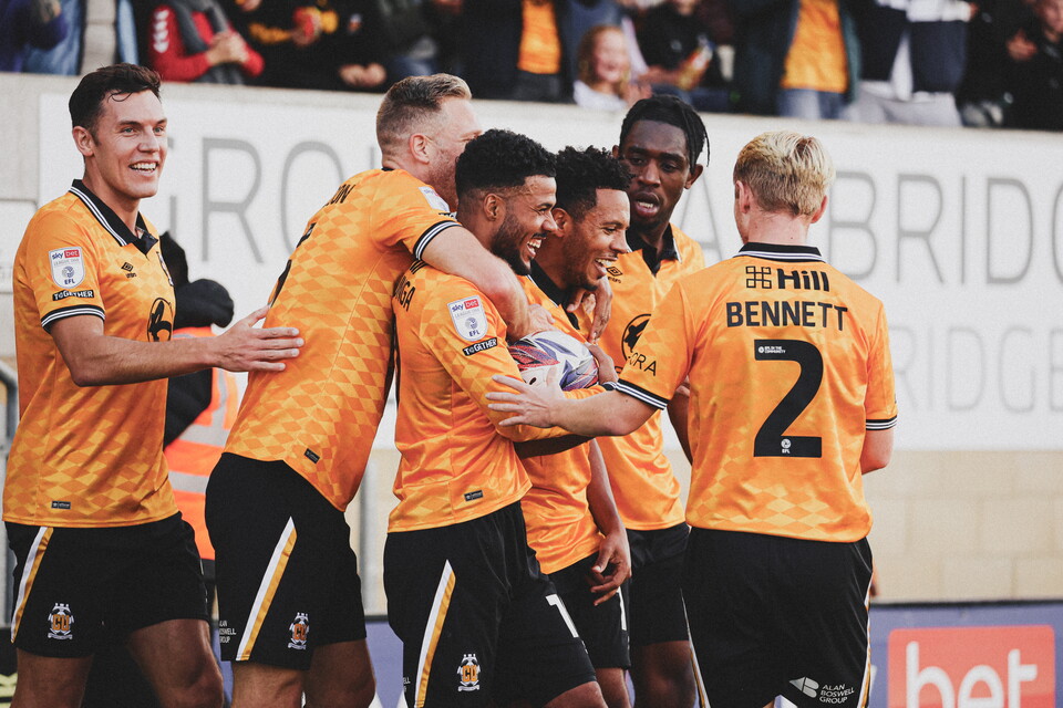 Cambridge United celebrate during the win over Wigan
