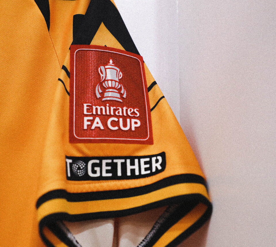 A close up of United's shirt with Emirates FA Cup branding