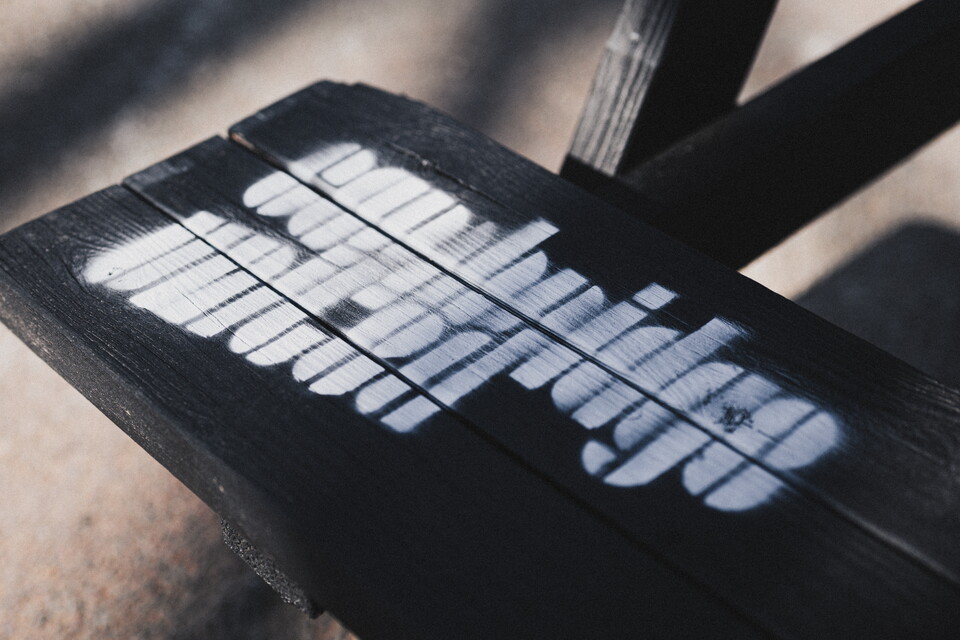 Cambridge United sprayed on a bench