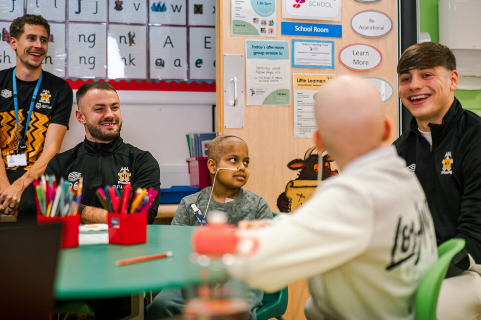 Players visit Pilgrim Pathways School