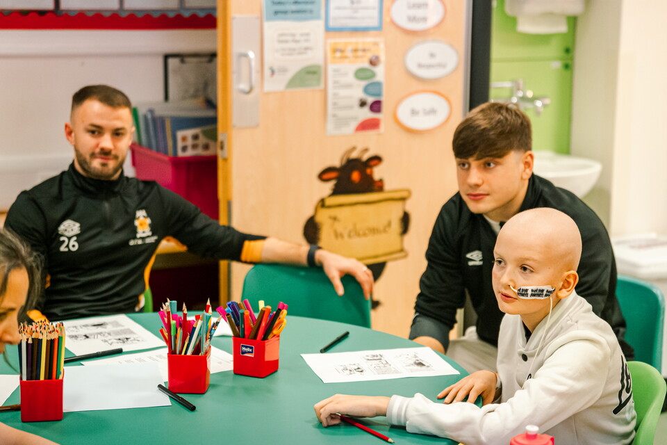 Players visit Pilgrim Pathways School
