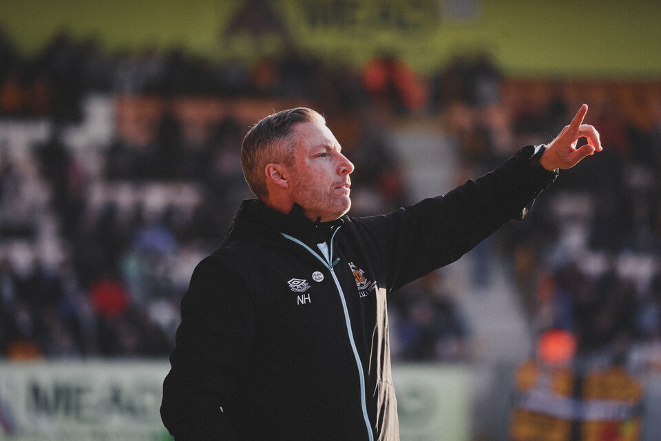 Neil Harris on the touchline