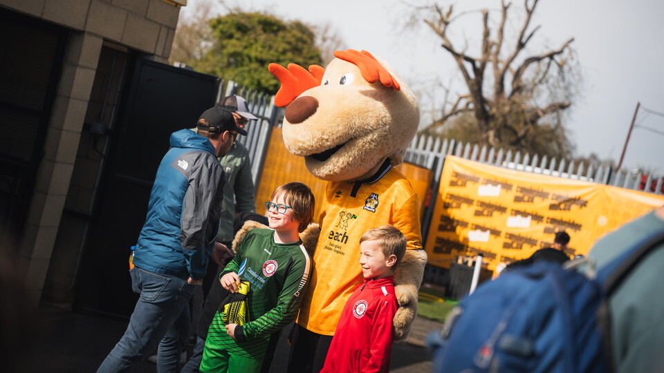 Fans with Marvin the Moose