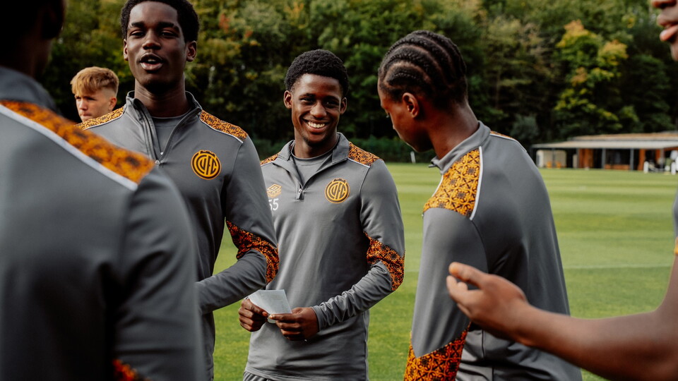 Cambridge United academy players with their exam results