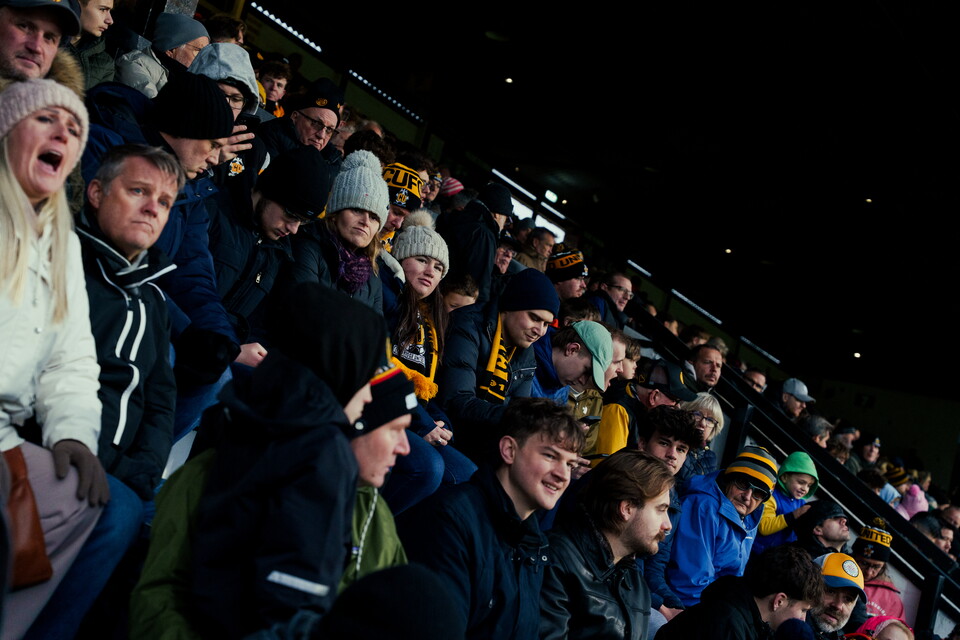 Fans at the Cledra Abbey Stadium