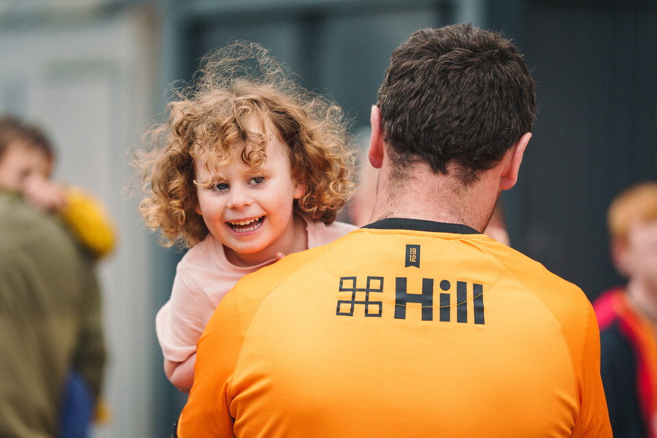 A young fan and her Dad at the Cledara Abbey Stadium