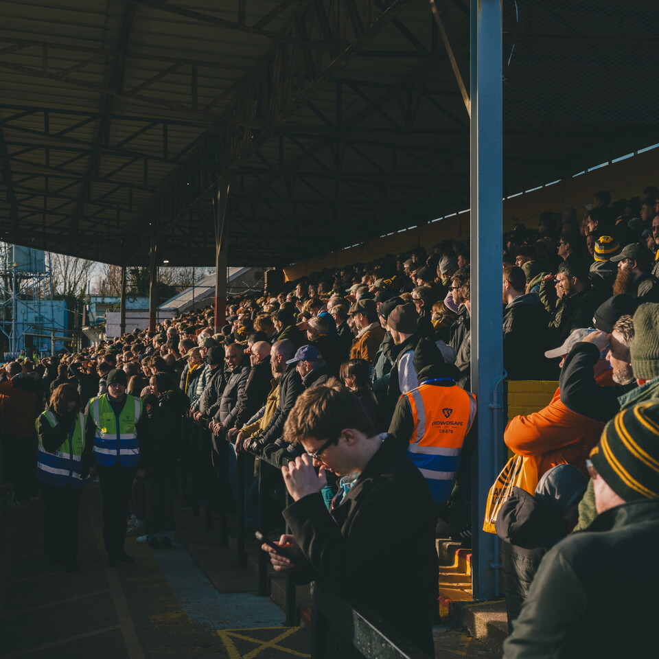 Fans at the Cledra Abbey Stadium