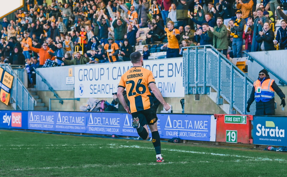 James Gibbons celebrates vs Salford City