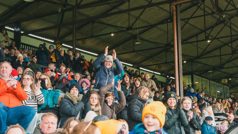 Fans at the Cledra Abbey Stadium