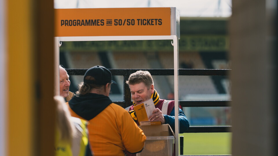 A Matchday Programme seller