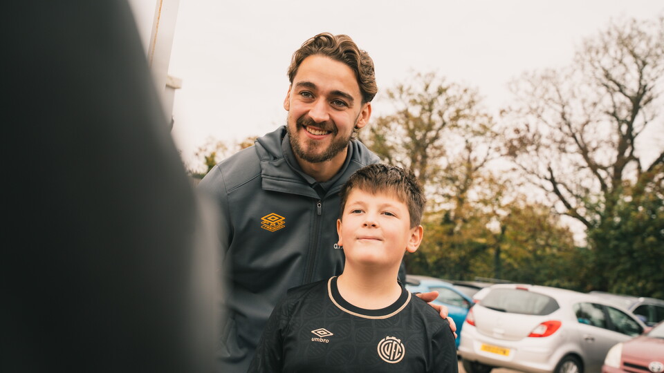 Louis Appere with a young fan
