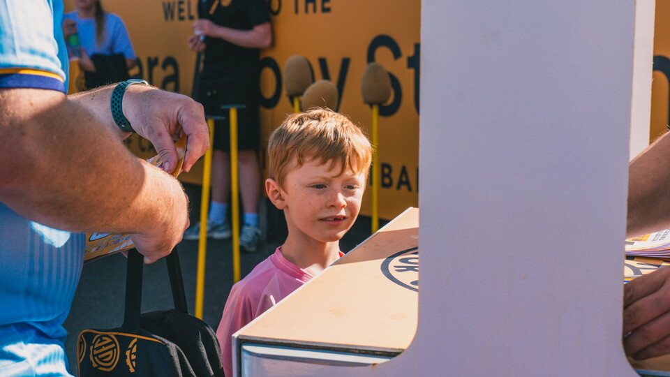 A young fan at the Junior U's Kids' Zone