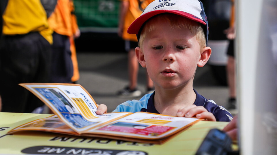 A young supporter gets his Matchday Passport stamped