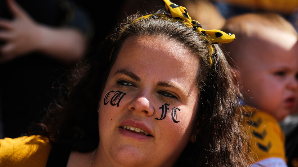 A female fan at Cambridge United