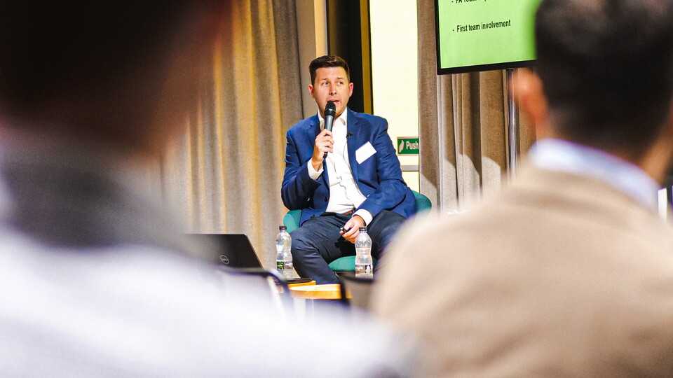 CEO Alex Tunbridge talking at a Business Club meeting