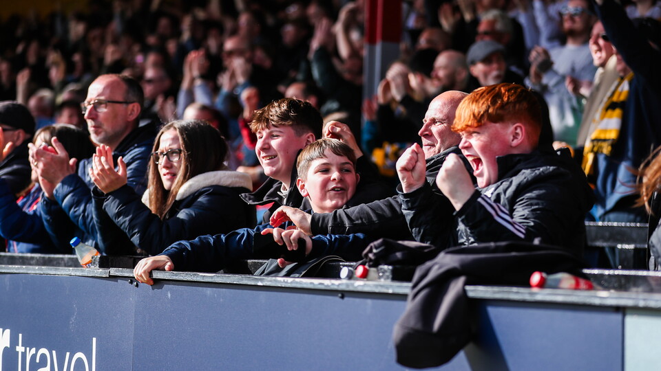 Fans celebrate in the NRE