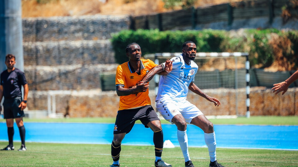 Jubril Okedina tussles for the ball