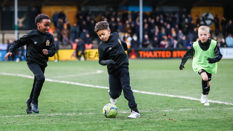 Academy players on the pitch