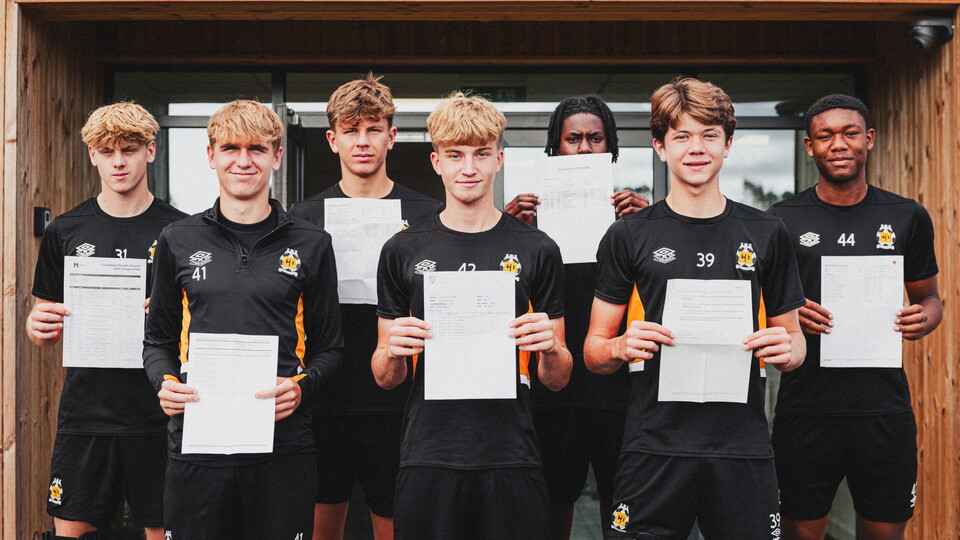 Cambridge United Scholars with their GCSE results