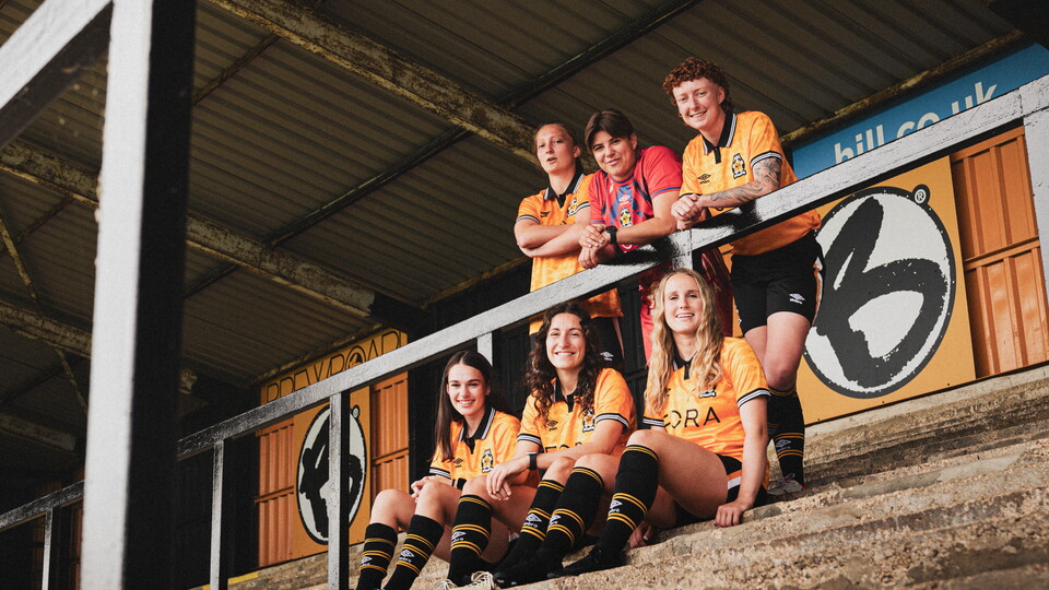 Cambridge United Women players pose at the Cledara Abbey Stadium