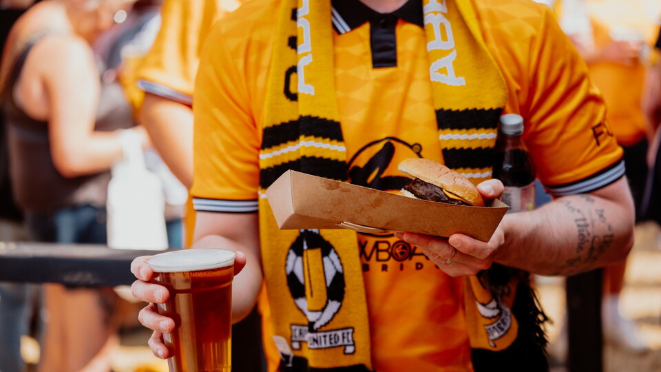 A close up of a U's fan at the game