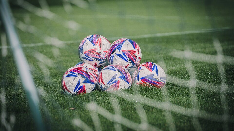 Footballs on the training pitch