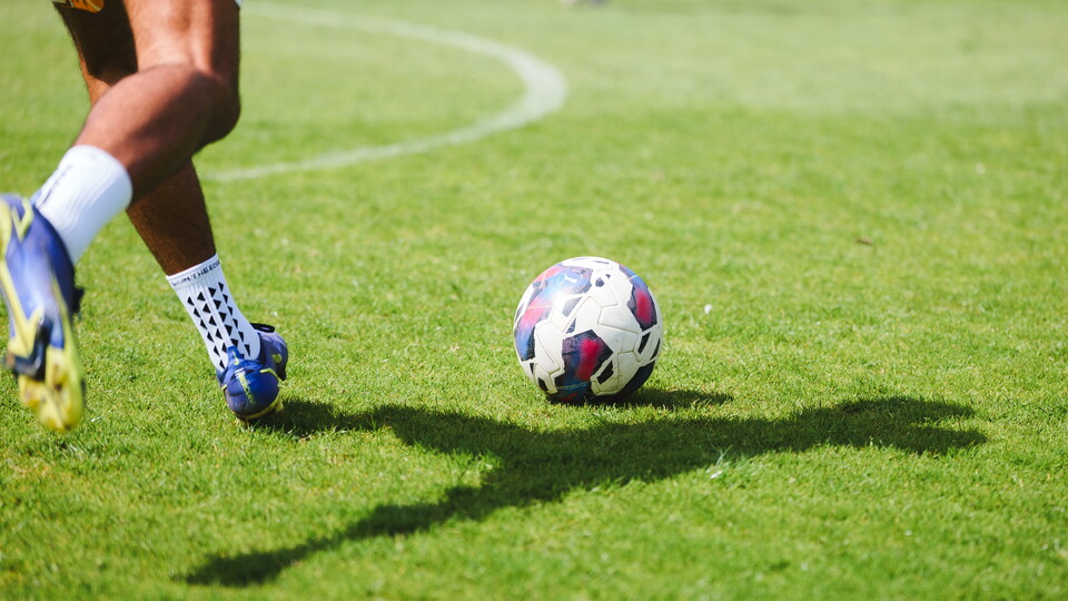 A player strikes the ball