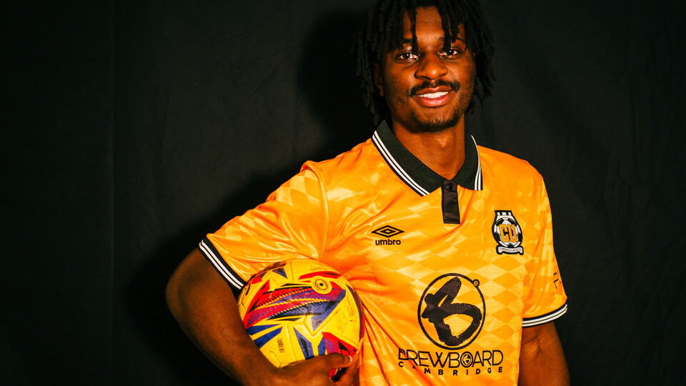 Esapa Osong signing photo