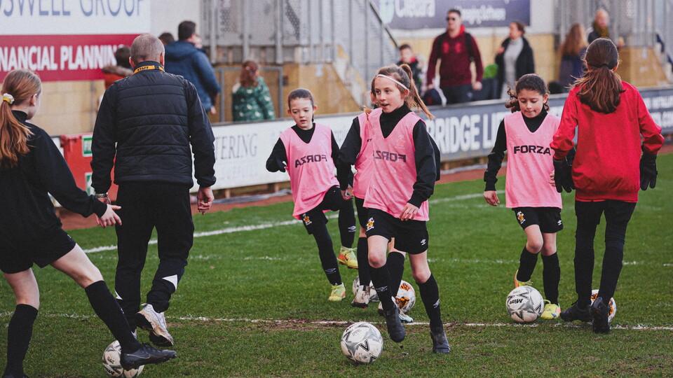 Girls players on the Cledara Abbey pitch