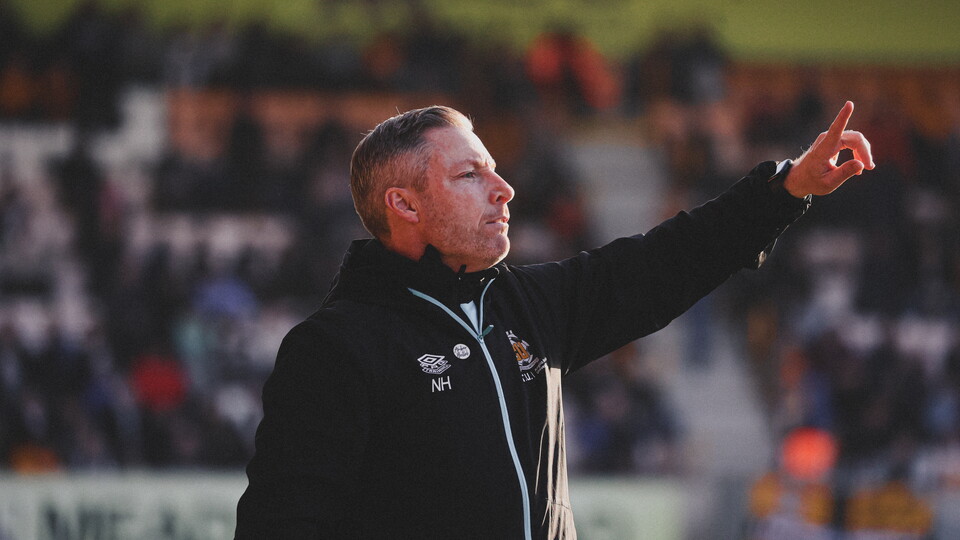 Neil Harris on the touchline