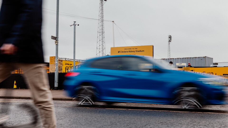 Cars pass the Cledara Abbey Stadium on Newmarket Road