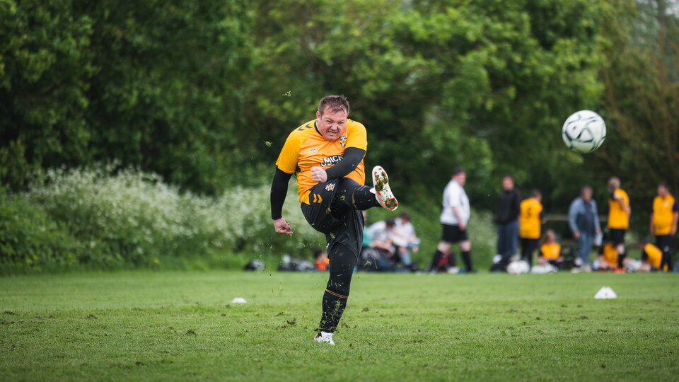 Community Hero Matthew Jeffrey playing football